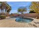 Relaxing kidney-shaped pool with waterfall feature at 7893 S Stephanie Ln, Tempe, AZ 85284