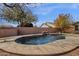 Inviting kidney-shaped pool with waterfall feature at 7893 S Stephanie Ln, Tempe, AZ 85284