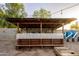 Backyard bar detail with wood construction and lattice at 7917 W Sierra Vista Dr, Glendale, AZ 85303