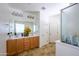 Double vanity bathroom with large mirror at 7917 W Sierra Vista Dr, Glendale, AZ 85303