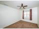 Bedroom with window curtains and ceiling fan at 7917 W Sierra Vista Dr, Glendale, AZ 85303