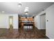 Updated kitchen featuring wood cabinets, granite countertops, and island with seating at 7917 W Sierra Vista Dr, Glendale, AZ 85303