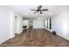 Open concept living room with hardwood floors and access to the backyard at 7917 W Sierra Vista Dr, Glendale, AZ 85303