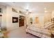 Cozy main bedroom featuring a fireplace, custom built-ins, and a plush bed at 8031 N 14Th Ave, Phoenix, AZ 85021