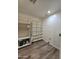 Laundry area with shelving and vinyl flooring at 813 S Doran Cir, Mesa, AZ 85204