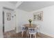 Small dining area with round table and white chairs at 8241 N Central Ave # 13, Phoenix, AZ 85020