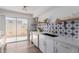 Modern kitchen with white cabinets, star tile backsplash at 8241 N Central Ave # 13, Phoenix, AZ 85020