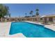 Inviting community pool with patio tables and chairs at 8241 N Central Ave # 13, Phoenix, AZ 85020