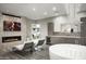 Spa-like bathroom with a freestanding tub and modern fixtures at 9016 N 60Th St, Paradise Valley, AZ 85253