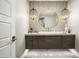 Modern powder room with a floating vanity and stylish lighting at 9016 N 60Th St, Paradise Valley, AZ 85253