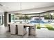 Bright dining area with large sliding doors leading to the pool at 9016 N 60Th St, Paradise Valley, AZ 85253