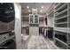 Large walk-in closet with ample shelving and storage at 9016 N 60Th St, Paradise Valley, AZ 85253