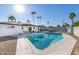 Inviting swimming pool with surrounding patio at 908 E Cavalier Dr, Phoenix, AZ 85014