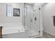 Updated bathroom with walk-in shower and tile flooring at 9236 E Canyon View Rd, Scottsdale, AZ 85255