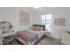 Cozy bedroom featuring a bed, nightstand, and desk at 9236 E Canyon View Rd, Scottsdale, AZ 85255