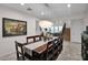 Elegant dining room with large table, chandelier, and statement artwork at 9236 E Canyon View Rd, Scottsdale, AZ 85255