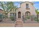 Two-story home with Spanish-style architecture and a landscaped front yard at 9236 E Canyon View Rd, Scottsdale, AZ 85255