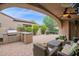 Relaxing patio with seating area and grill at 9236 E Canyon View Rd, Scottsdale, AZ 85255