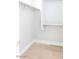 Small reach-in closet with hanging rod and shelf at 10018 E Hillside Dr, Scottsdale, AZ 85255