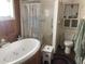 Bathroom with a bathtub, shower, and toilet at 1041 E 9Th Dr, Mesa, AZ 85204