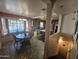 Kitchen and dining area with island and staircase at 1041 E 9Th Dr, Mesa, AZ 85204