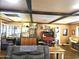 Spacious living room with exposed wood beams and abundant natural light at 1041 E 9Th Dr, Mesa, AZ 85204