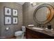 Powder room with ornate vanity and mirror at 10452 E Quartz Rock Rd, Scottsdale, AZ 85255