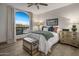 Bedroom with mountain view and arch window at 10452 E Quartz Rock Rd, Scottsdale, AZ 85255