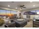 Relaxing bonus room with sunset views and sectional sofa at 10452 E Quartz Rock Rd, Scottsdale, AZ 85255