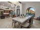 Elegant dining room with a large table and mountain views at 10452 E Quartz Rock Rd, Scottsdale, AZ 85255