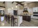 Gourmet kitchen boasts granite counters, high-end appliances, and a large island at 10452 E Quartz Rock Rd, Scottsdale, AZ 85255