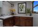 Laundry room with ample counter space and cabinets at 10452 E Quartz Rock Rd, Scottsdale, AZ 85255