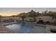 Relaxing pool area with mountain views at sunset at 10452 E Quartz Rock Rd, Scottsdale, AZ 85255