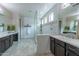 Spa-like bathroom with double sinks, a large shower, and modern finishes at 10538 E Sheffield Dr, Mesa, AZ 85212