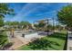 Outdoor entertainment area with bocce ball court and fire pit at 10538 E Sheffield Dr, Mesa, AZ 85212