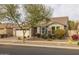 House exterior, showcasing landscaping and driveway at 10538 E Sheffield Dr, Mesa, AZ 85212