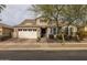 Charming curb appeal with a well-manicured lawn at 10538 E Sheffield Dr, Mesa, AZ 85212