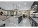 Kitchen island with granite countertops and stainless steel appliances at 10538 E Sheffield Dr, Mesa, AZ 85212