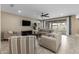 Bright living room with sliding glass doors leading to backyard at 10538 E Sheffield Dr, Mesa, AZ 85212