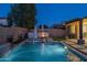 Luxury pool and spa with waterfall feature at 10538 E Sheffield Dr, Mesa, AZ 85212