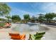 Relaxing splash pad with colorful chairs for lounging at 10538 E Sheffield Dr, Mesa, AZ 85212