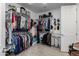 Large walk-in closet with ample shelving and hanging space at 10538 E Sheffield Dr, Mesa, AZ 85212