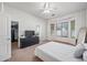 Main bedroom with large window and walk-in closet at 1082 W Aspen Ave, Gilbert, AZ 85233