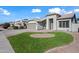 House exterior showcasing a landscaped yard and driveway at 1082 W Aspen Ave, Gilbert, AZ 85233