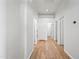 Light and bright hallway with wood flooring at 1082 W Aspen Ave, Gilbert, AZ 85233