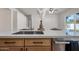 Kitchen island with sink, ample seating and storage at 1082 W Aspen Ave, Gilbert, AZ 85233