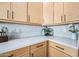 Clean lines and light wood cabinets highlight this modern kitchen at 1082 W Aspen Ave, Gilbert, AZ 85233