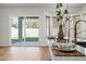 Modern kitchen with island and sliding glass doors to backyard at 1082 W Aspen Ave, Gilbert, AZ 85233