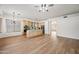 Bright kitchen with island, stainless steel appliances, and light wood cabinets at 1082 W Aspen Ave, Gilbert, AZ 85233