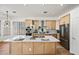 Modern kitchen featuring a large island, stainless steel appliances, and ample counter space at 1082 W Aspen Ave, Gilbert, AZ 85233